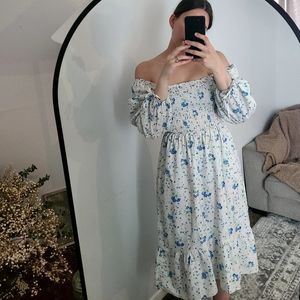 Floral shirred fluted sleeve dress